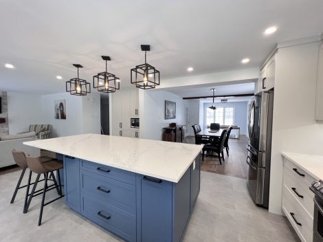 Inside image of a house with some lights and table chairs